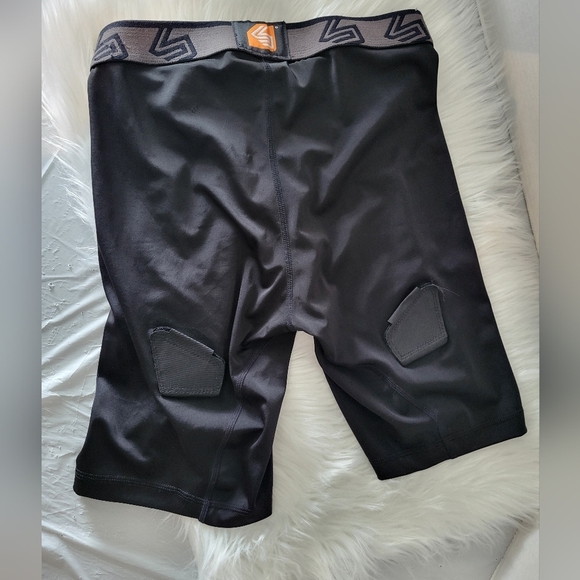 Shock Doctor Black and Orange Hockey Shorts, Size Large (28) - Picture 3 of 6
